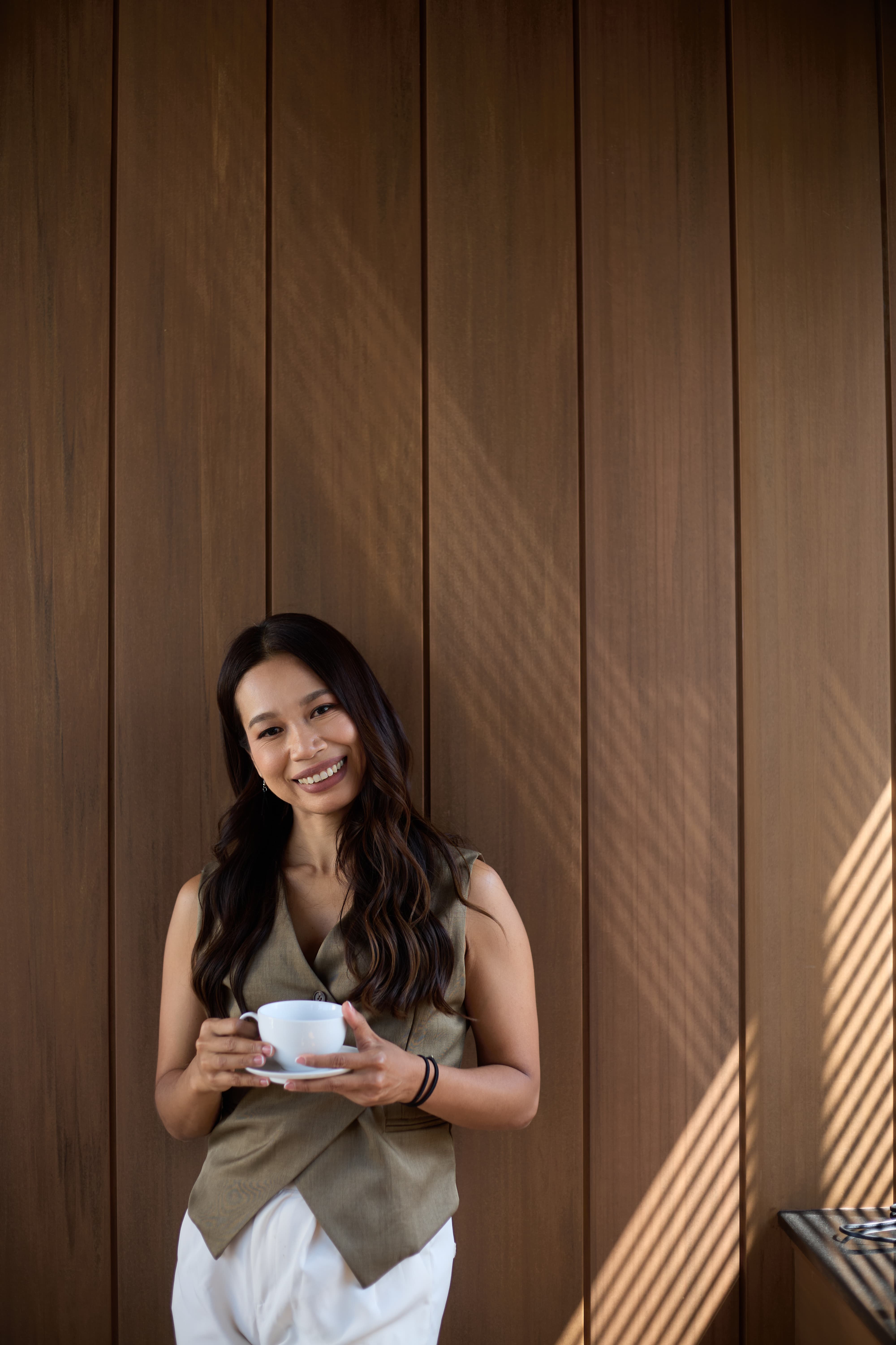Fon Ward, SEO consultant at Search Studio, with coffee